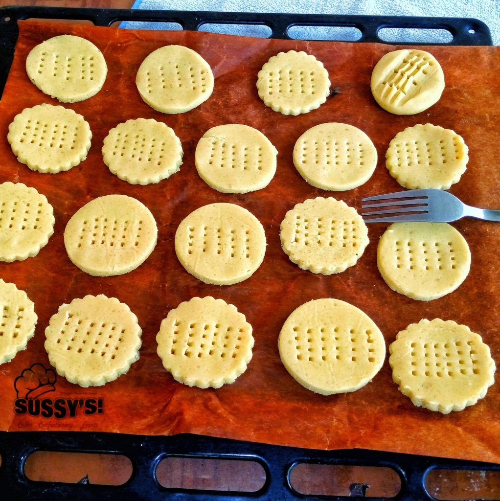 Use the tines of a fork to pierce cookies cut-out 